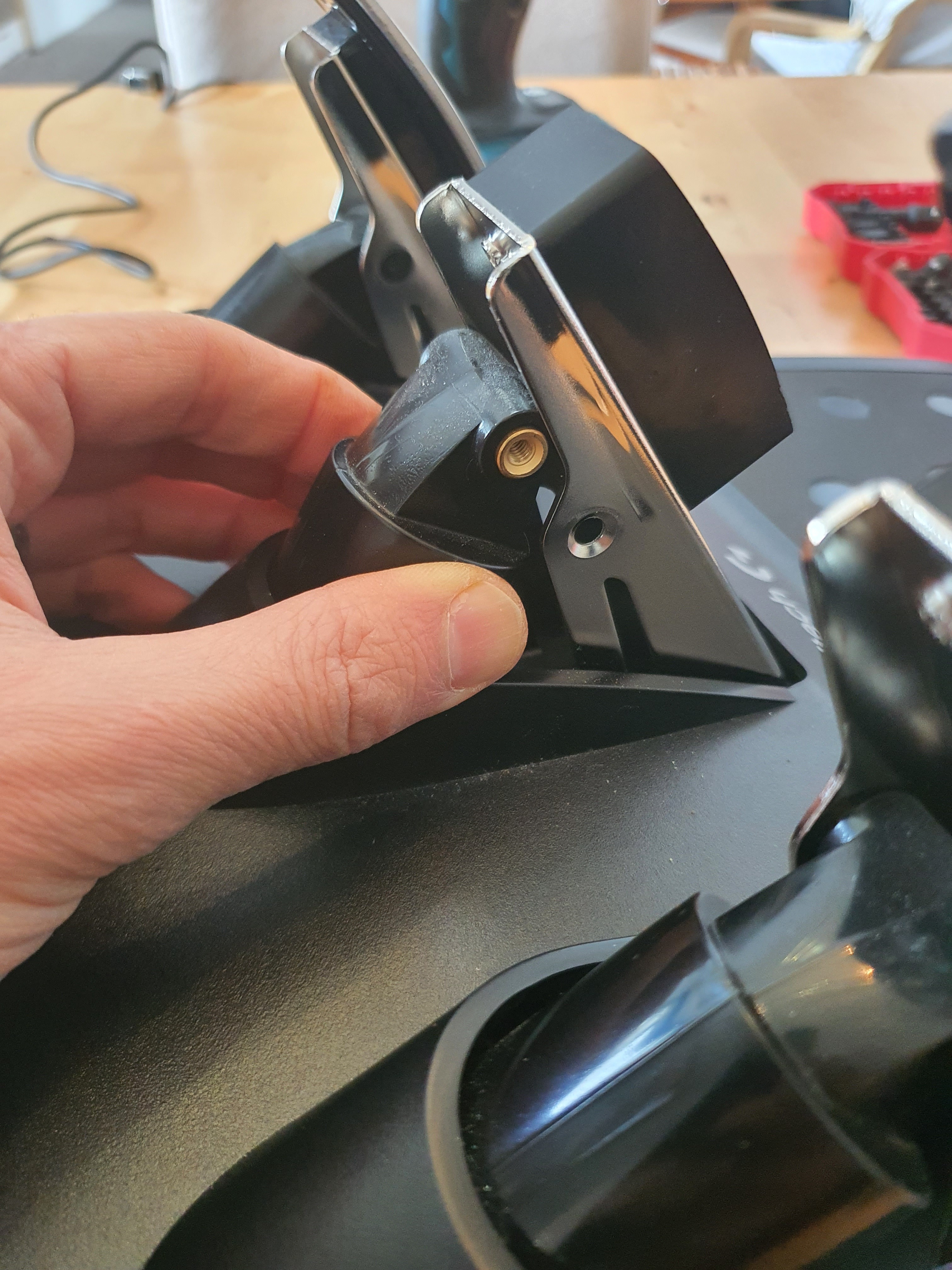 Removing the top of the pedal assembly from the spring